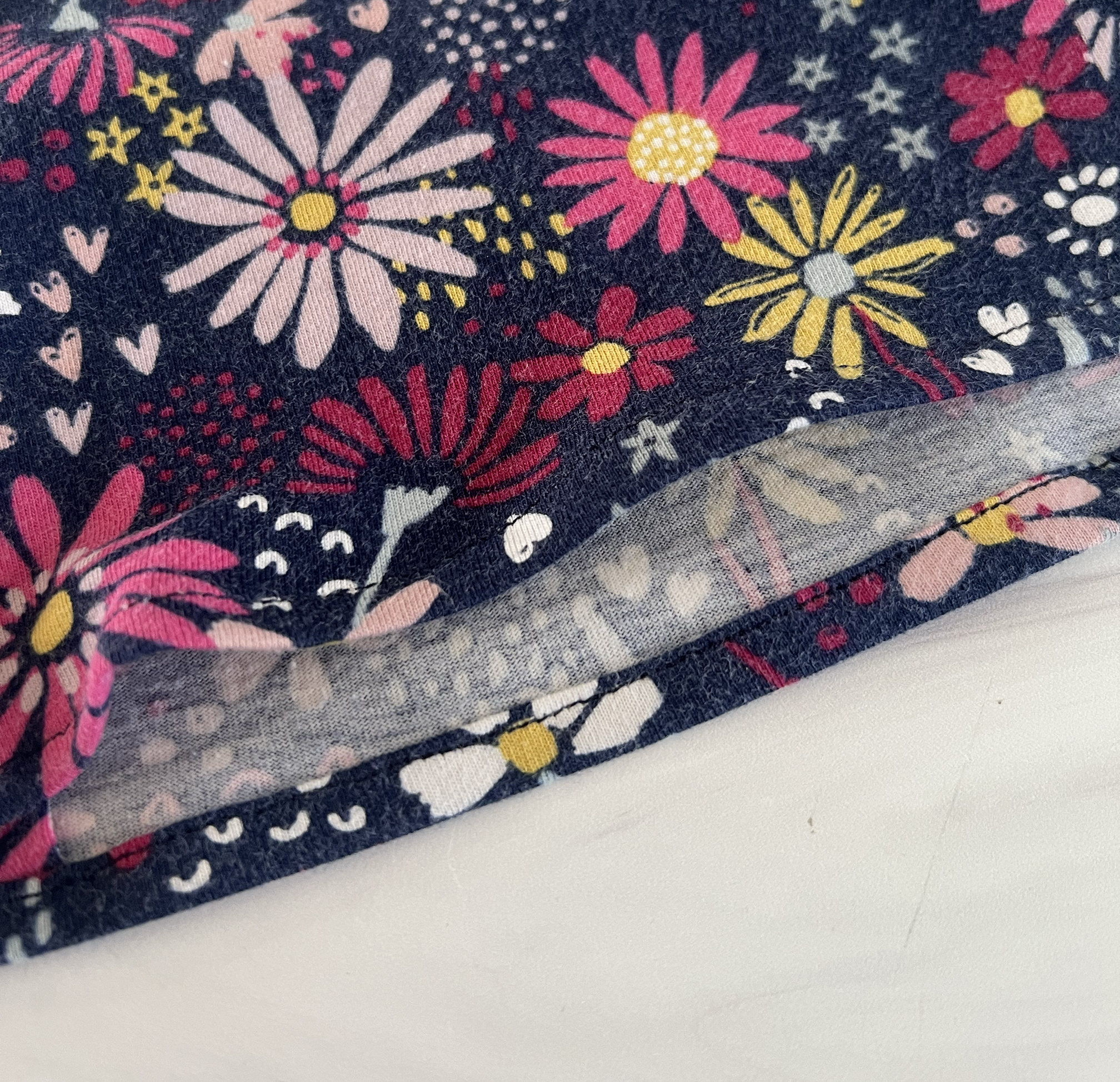 The hem of the doll skirt is finished.