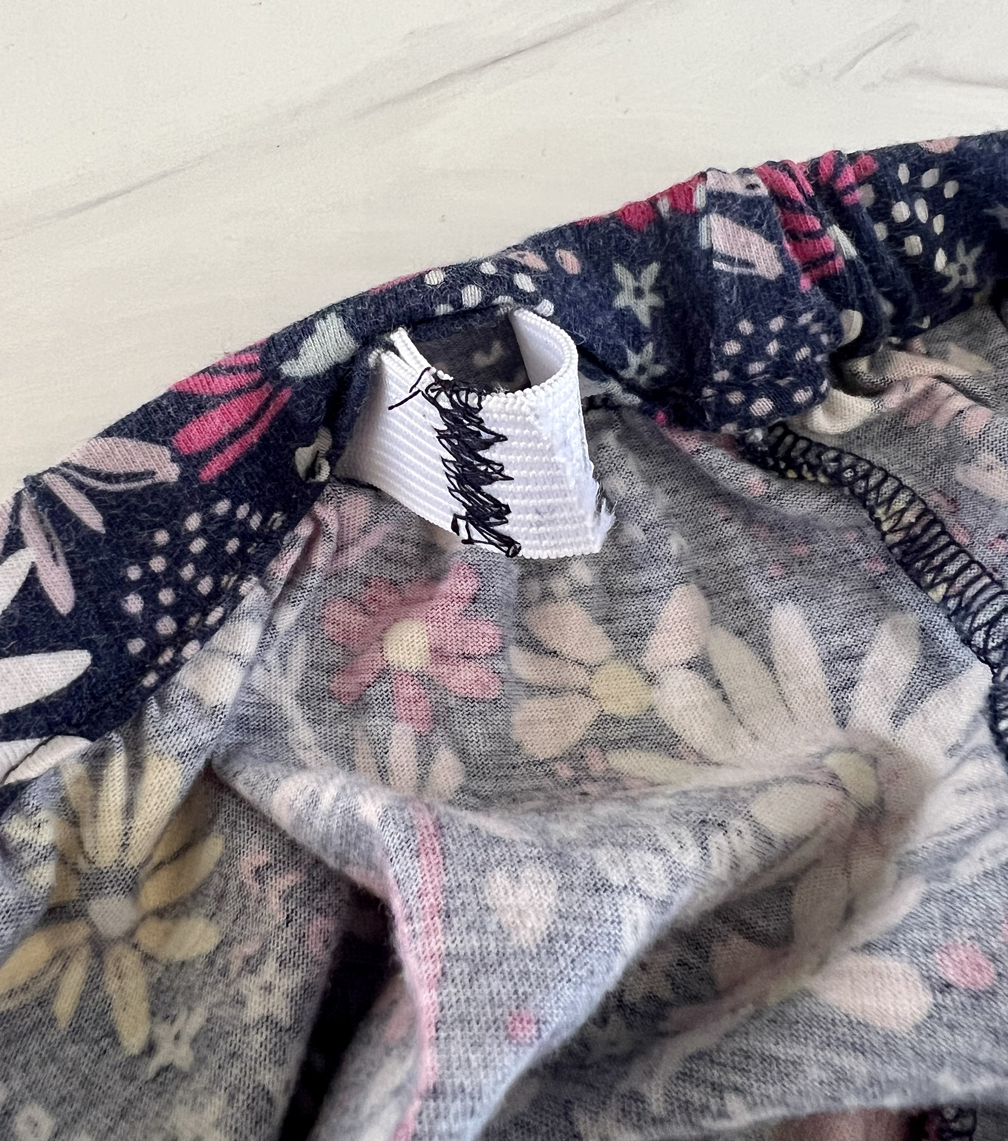 The ends of the elastic are stitched closed.