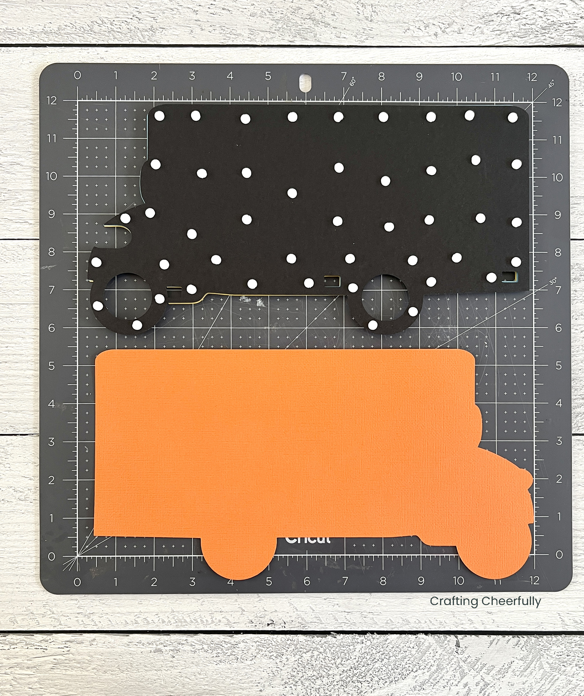 Foam dots cover the back of the black cardstock.