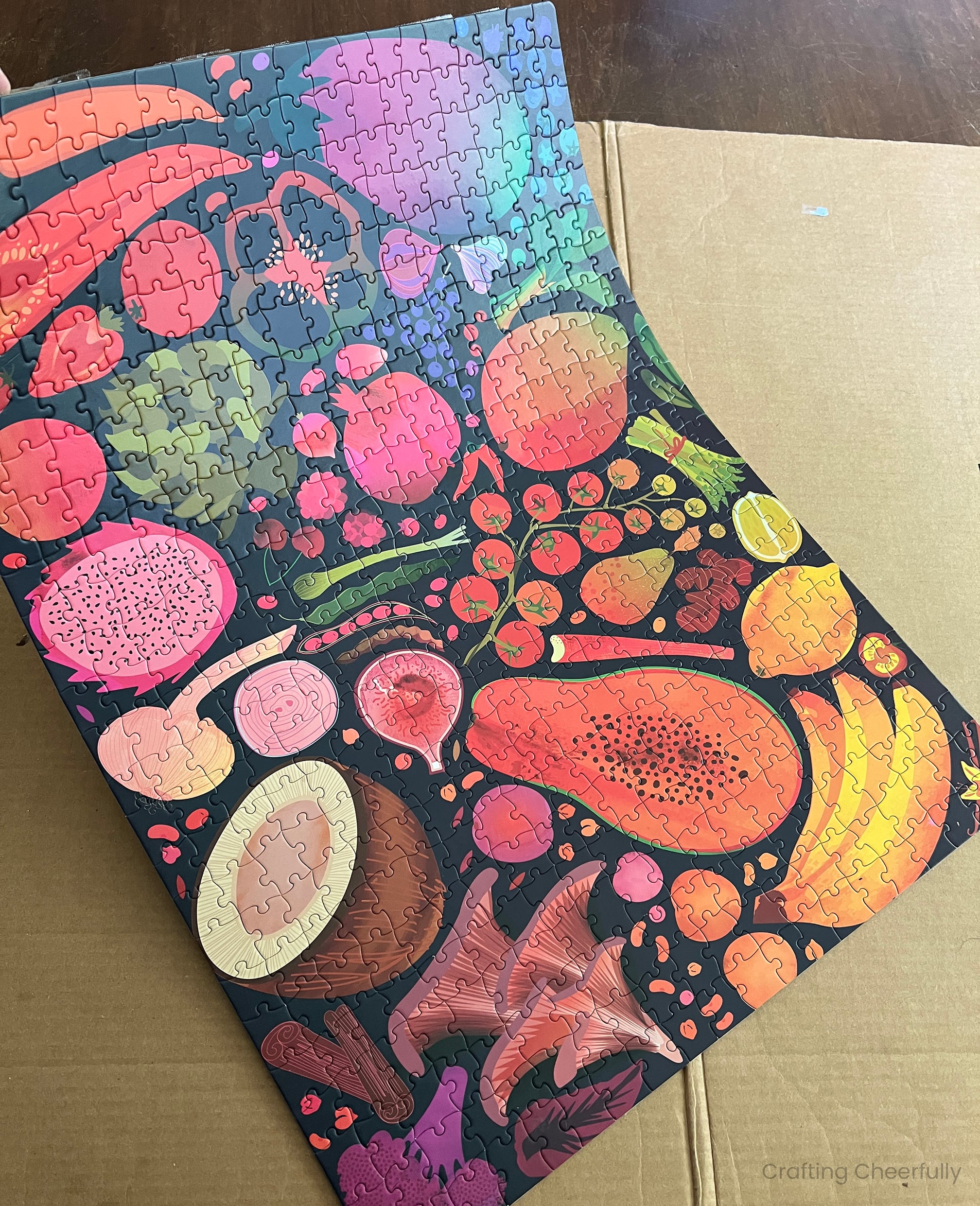 The puzzle is lifted up by a corner showing how the puzzle is attached.