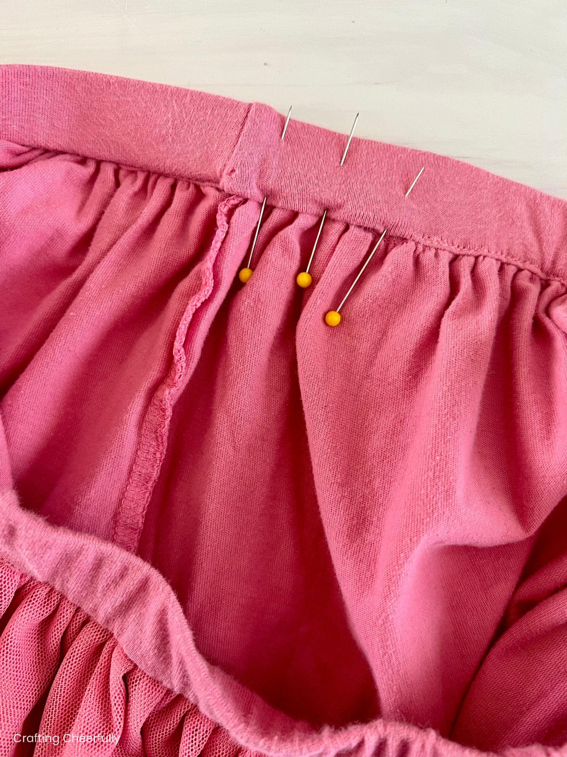 The gap where the elastic is inserted is pinned closed.