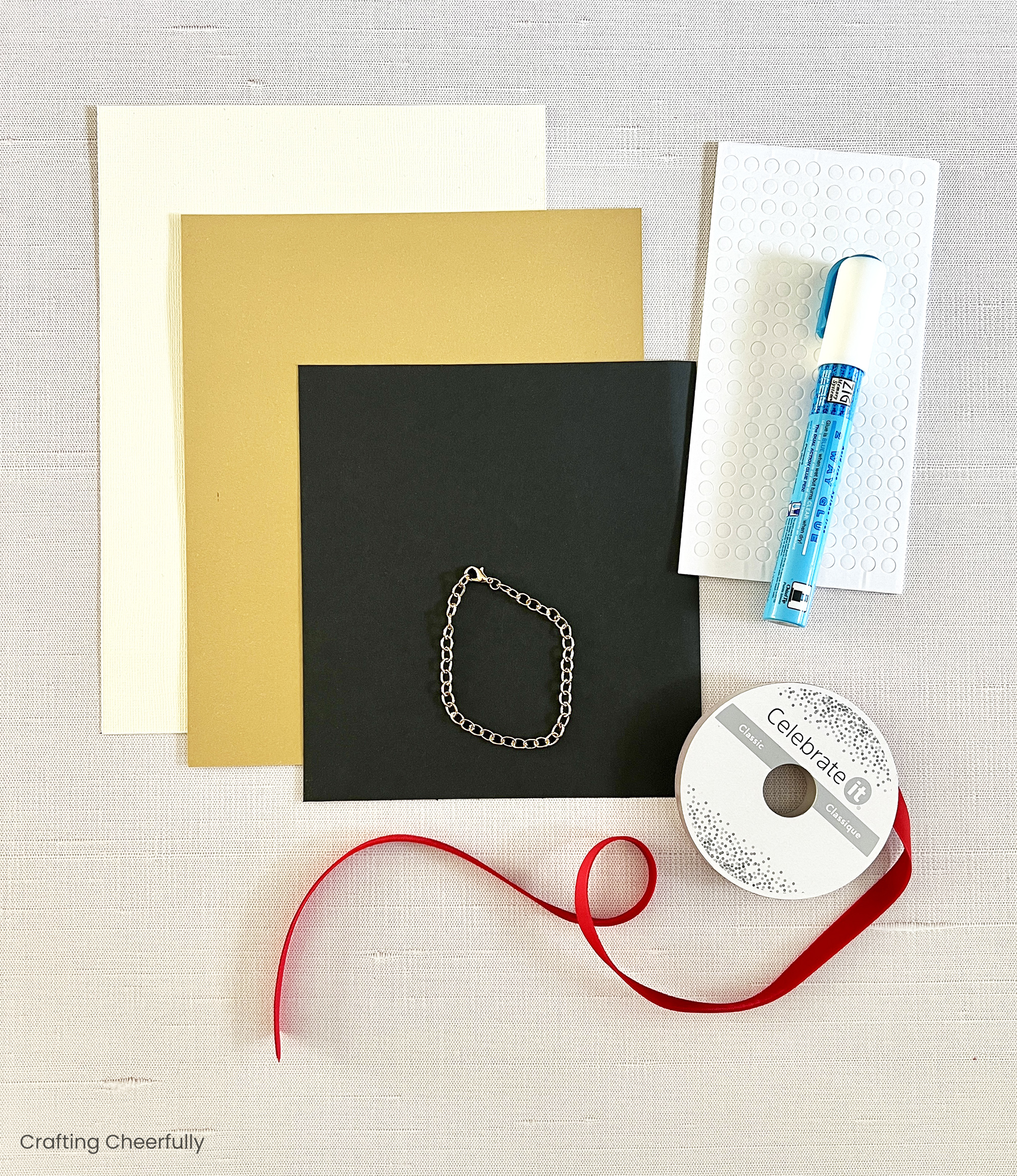 Supplies needed including cardstock, velvet ribbon, foam dots and a glue pen.