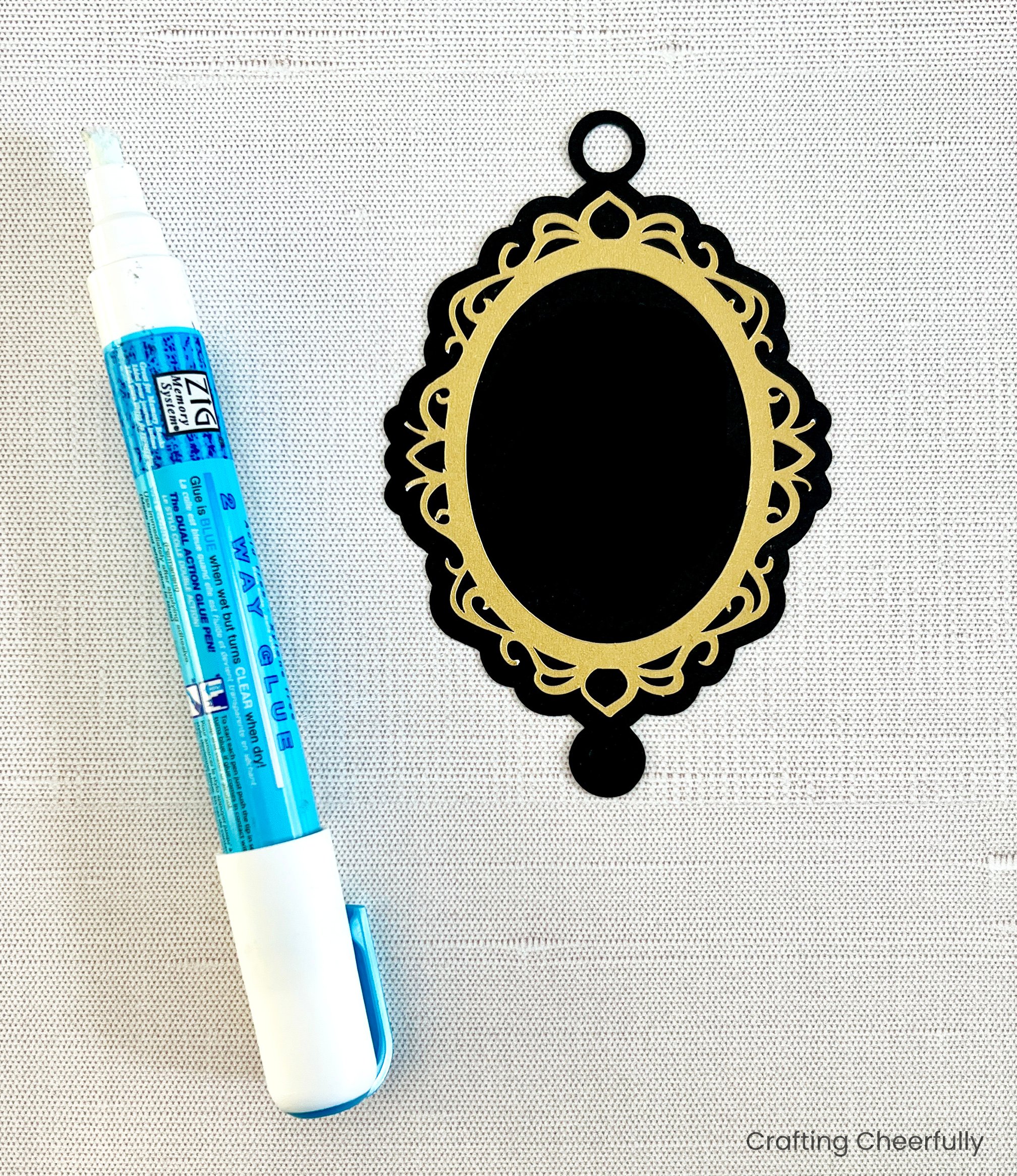 The gold layer is glued to the black layer.