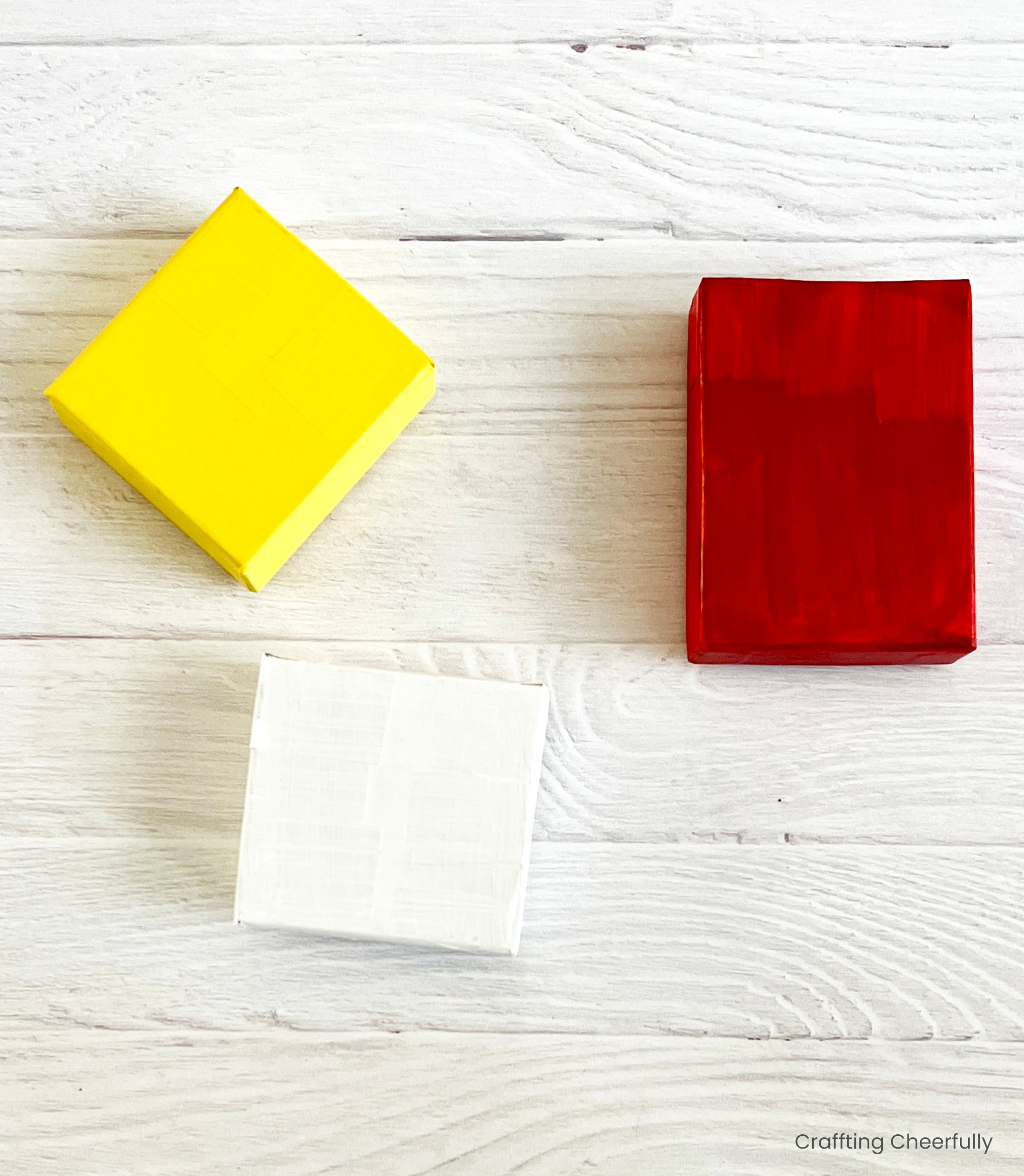 Three small boxes are painted.