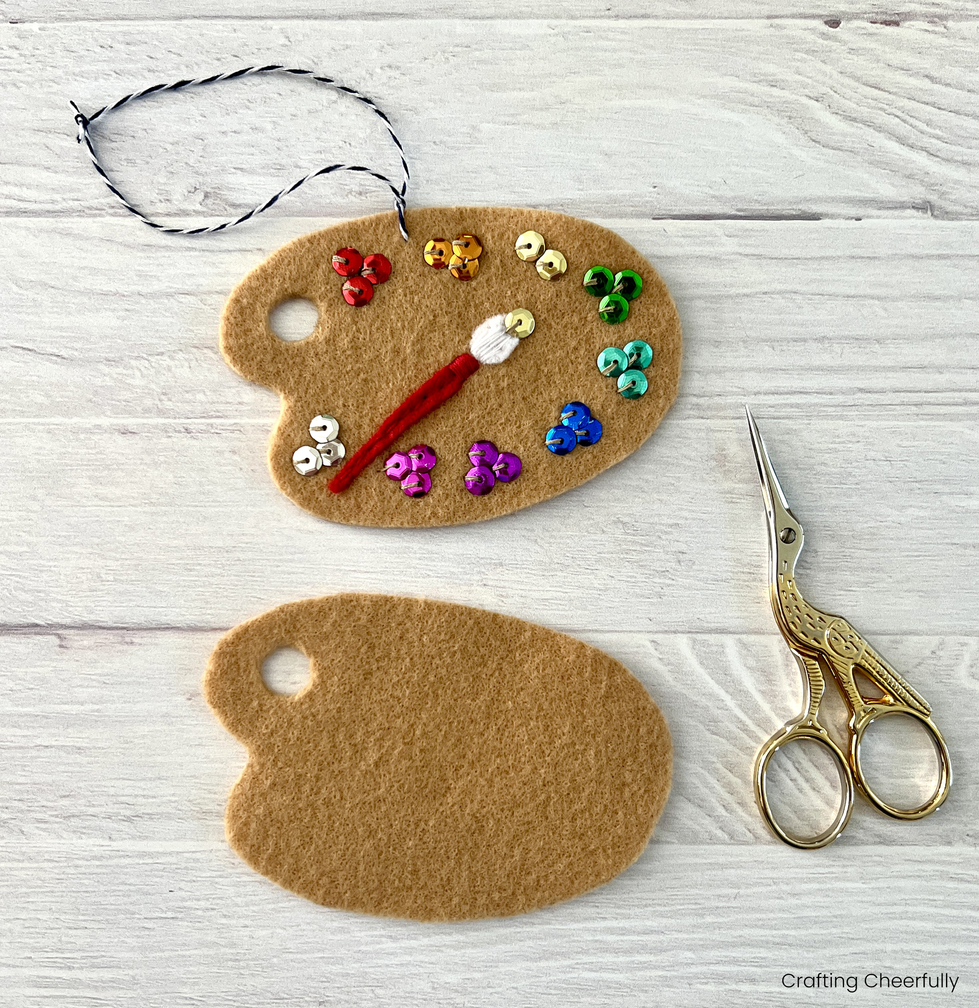 A second paint palette is cut from felt to match the first.