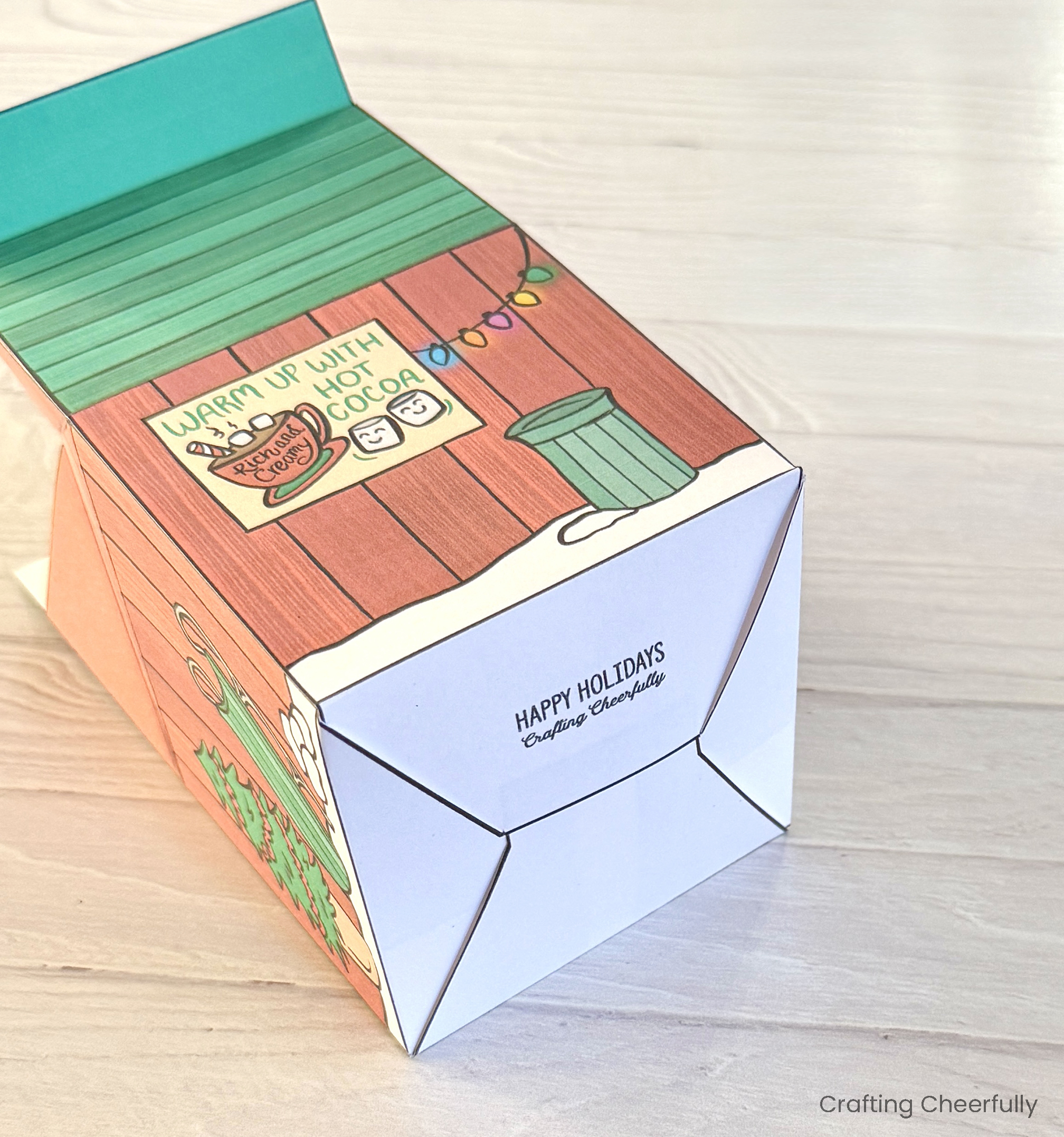 The two pieces of the box are assembled and the bottom is folded together.