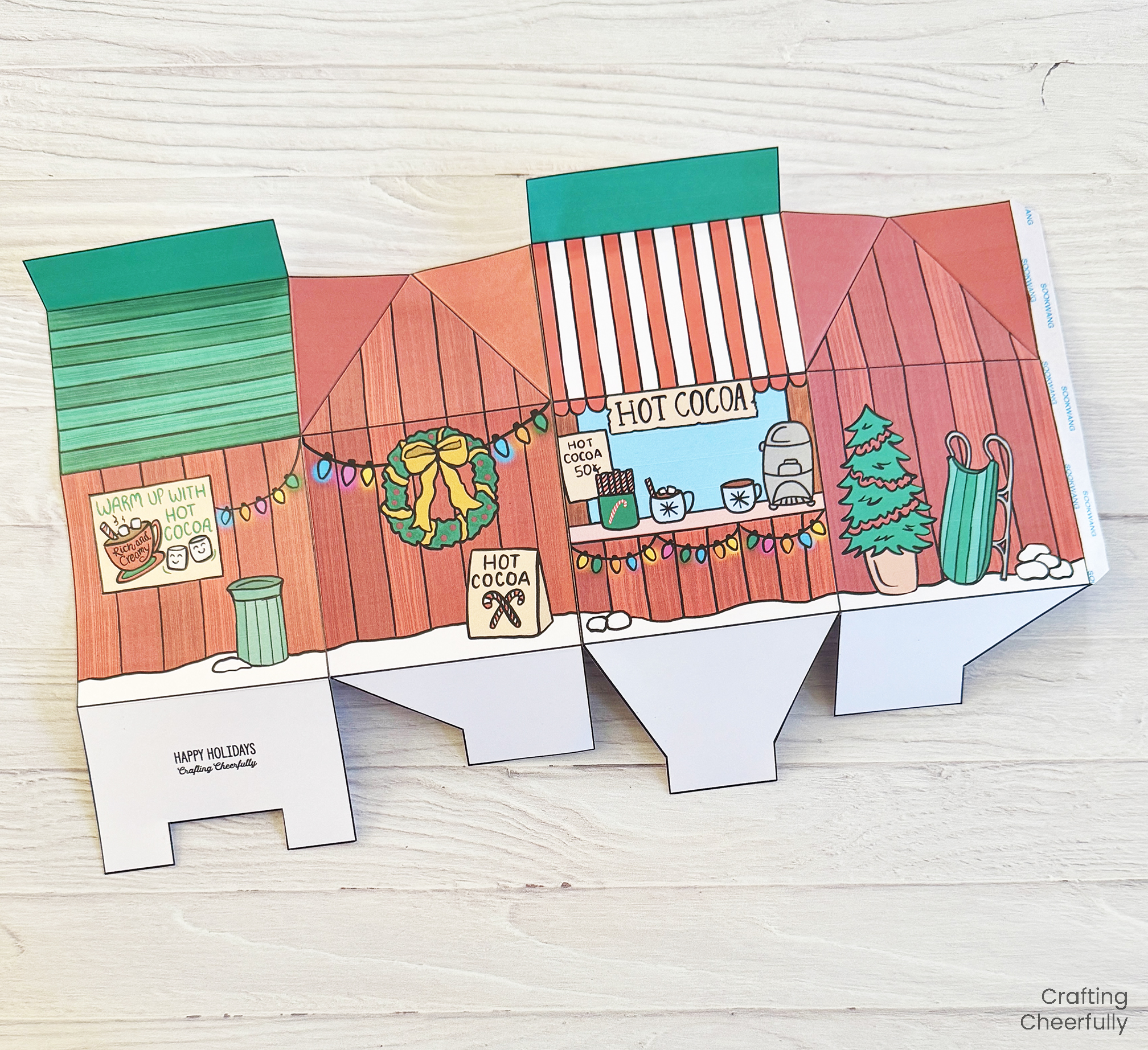 Two box pieces are attached along the first tab.