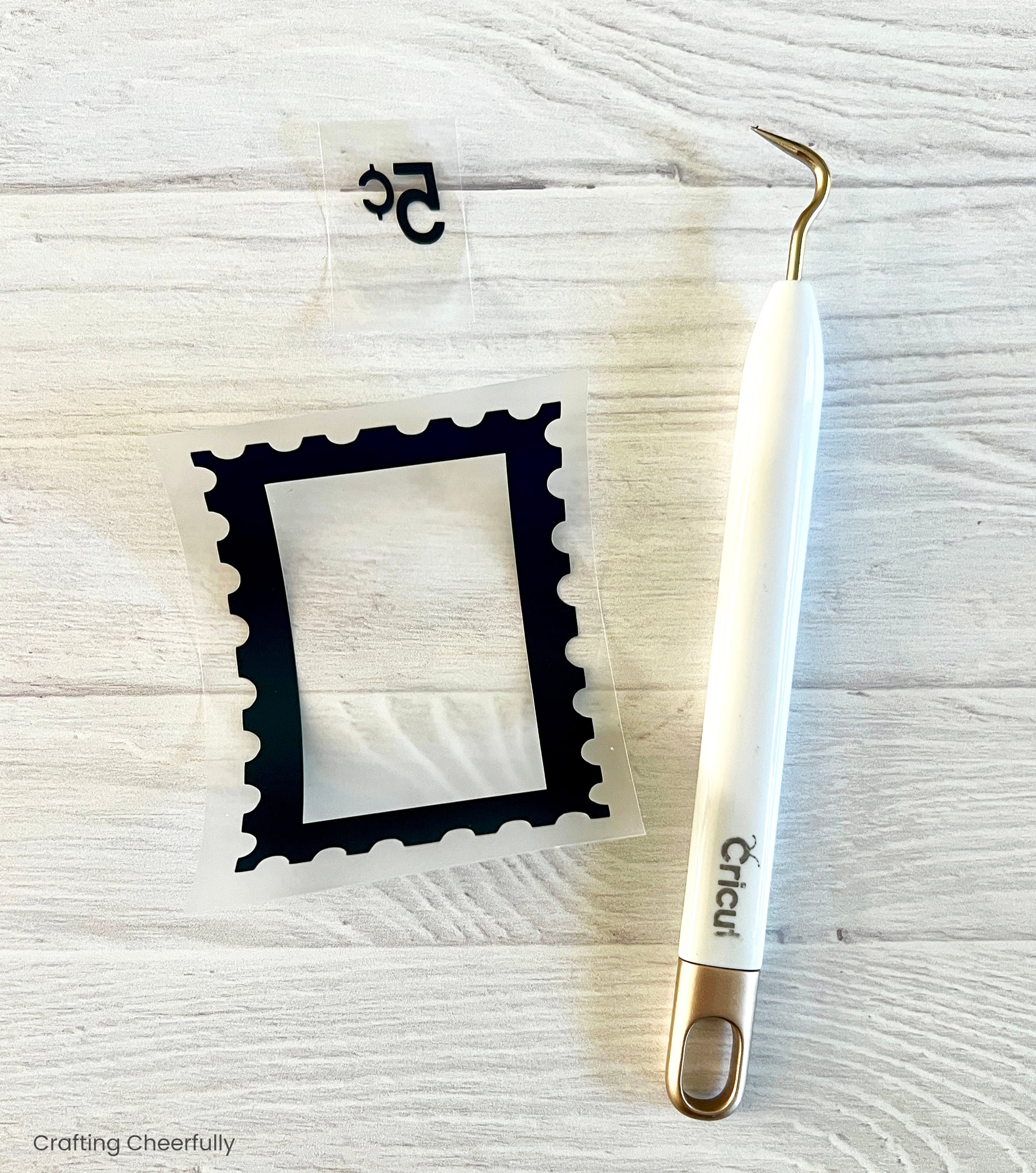 Black iron on is weeded after being cut by a Cricut Cutting Machine.