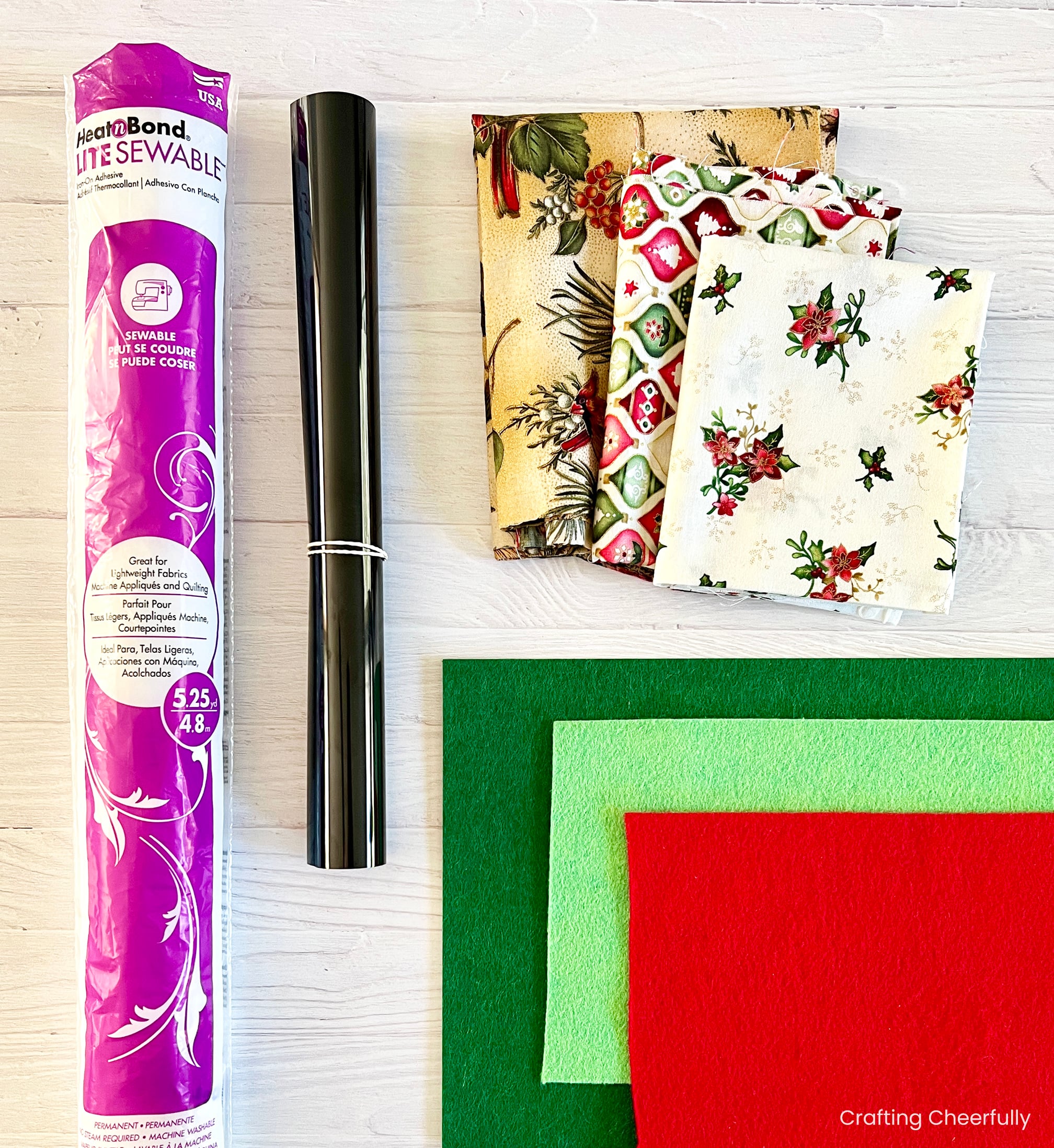 Felt, fabric scraps, black iron-on vinyl and fusible interfacing.