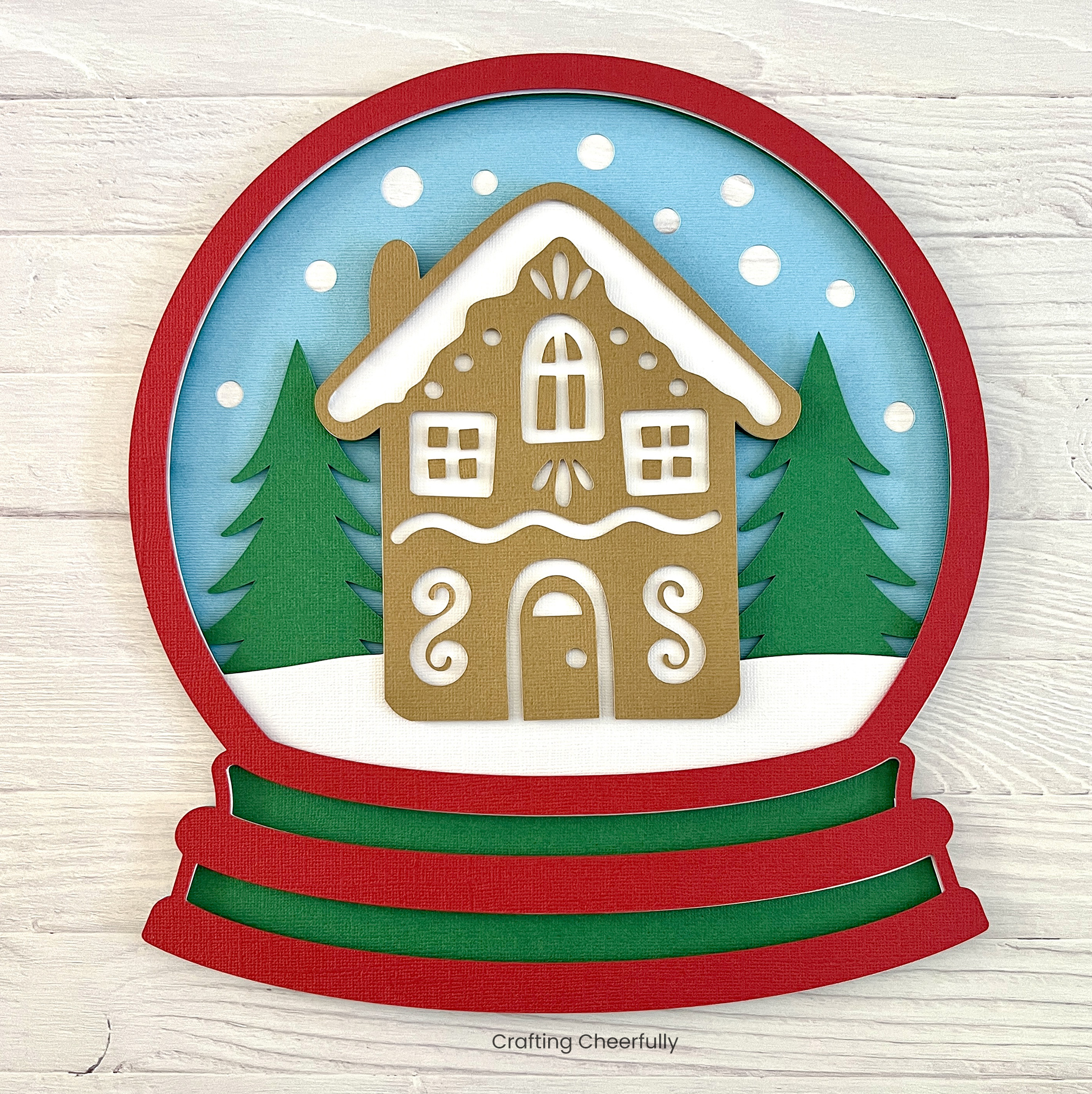 Snowglobe is layered together with red, white, green and light blue layers.