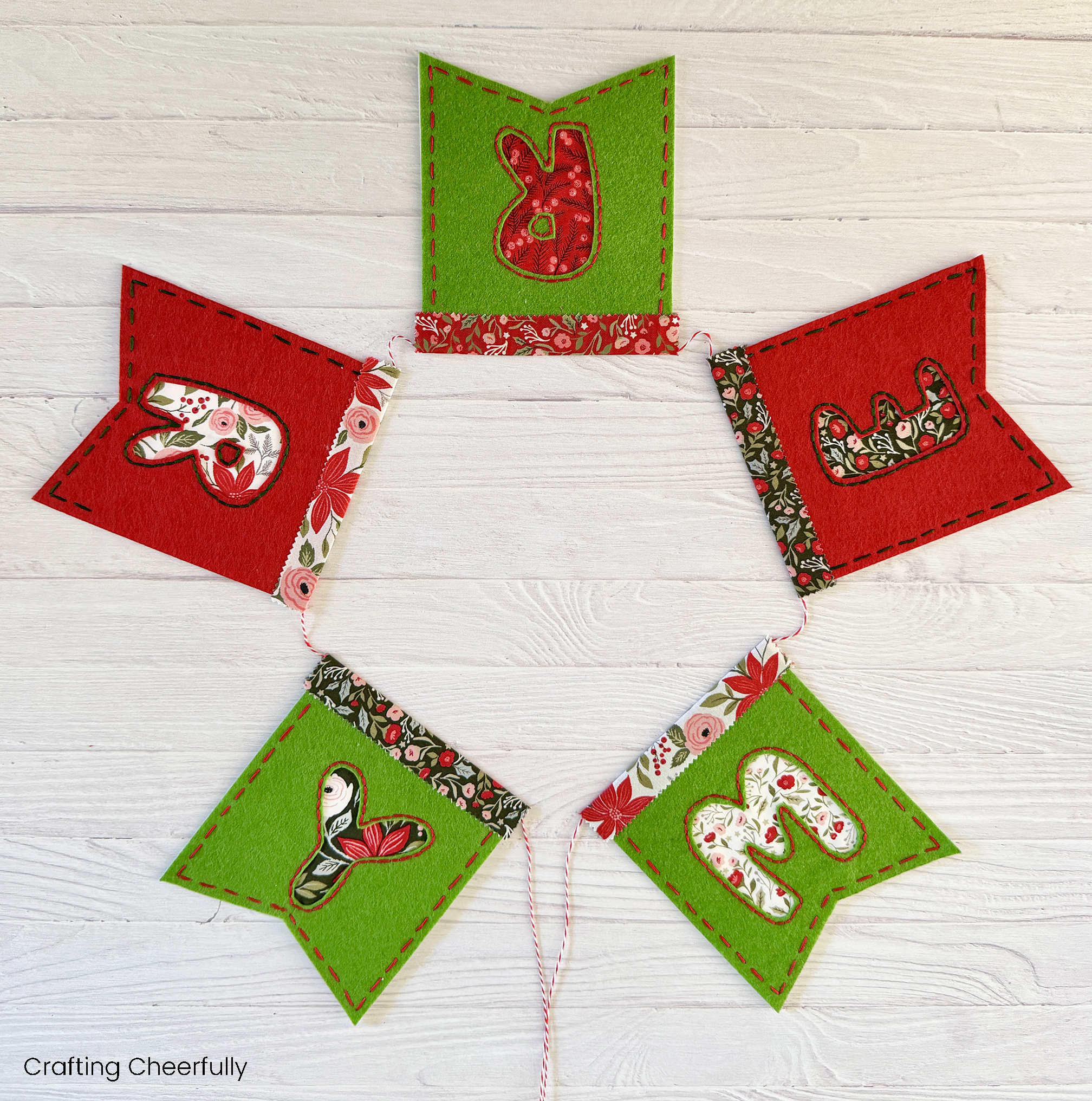 Merry Holiday banner made with reverse applique.