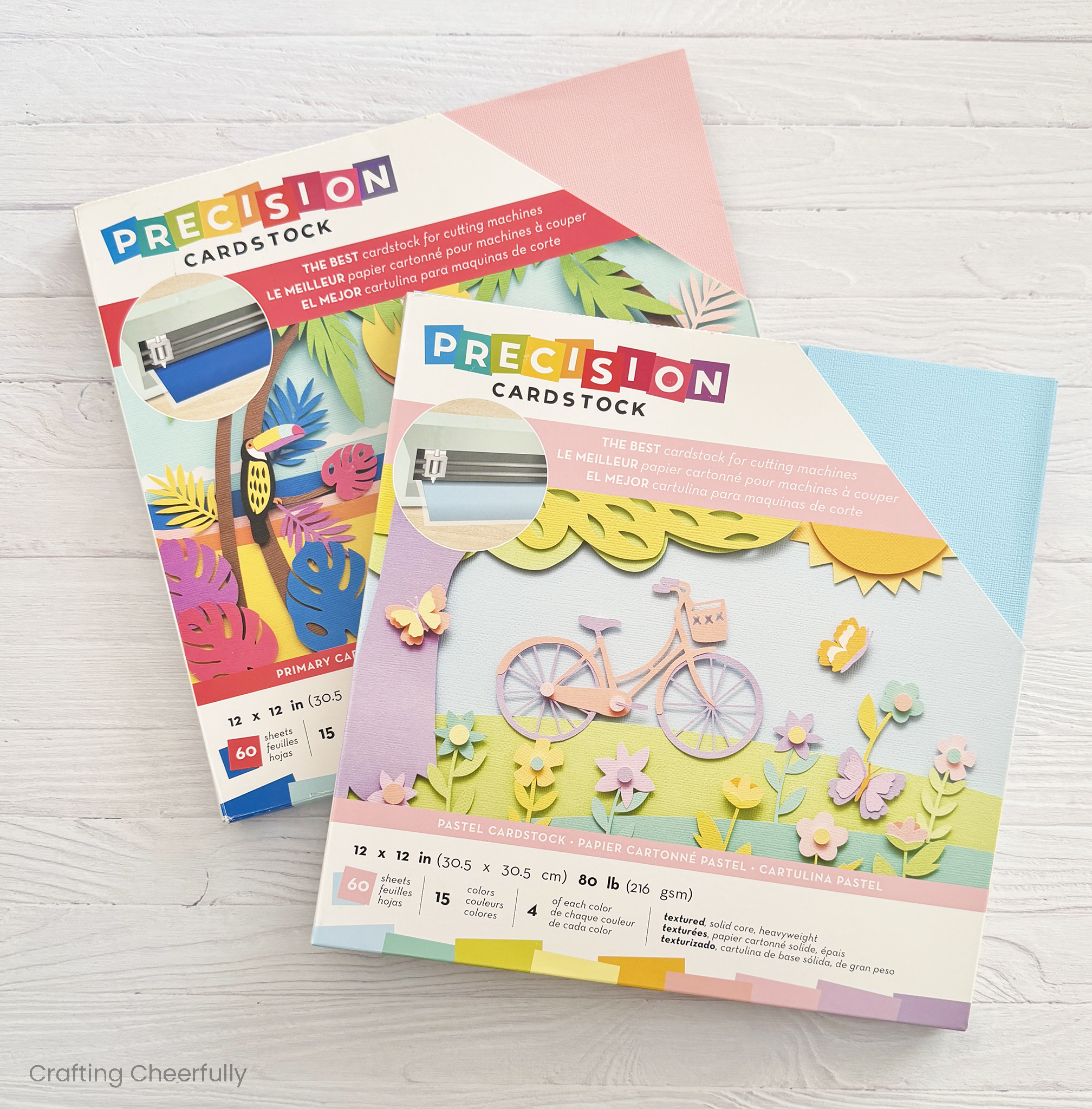 Two paper stacks by American Crafts lay on a white surface.