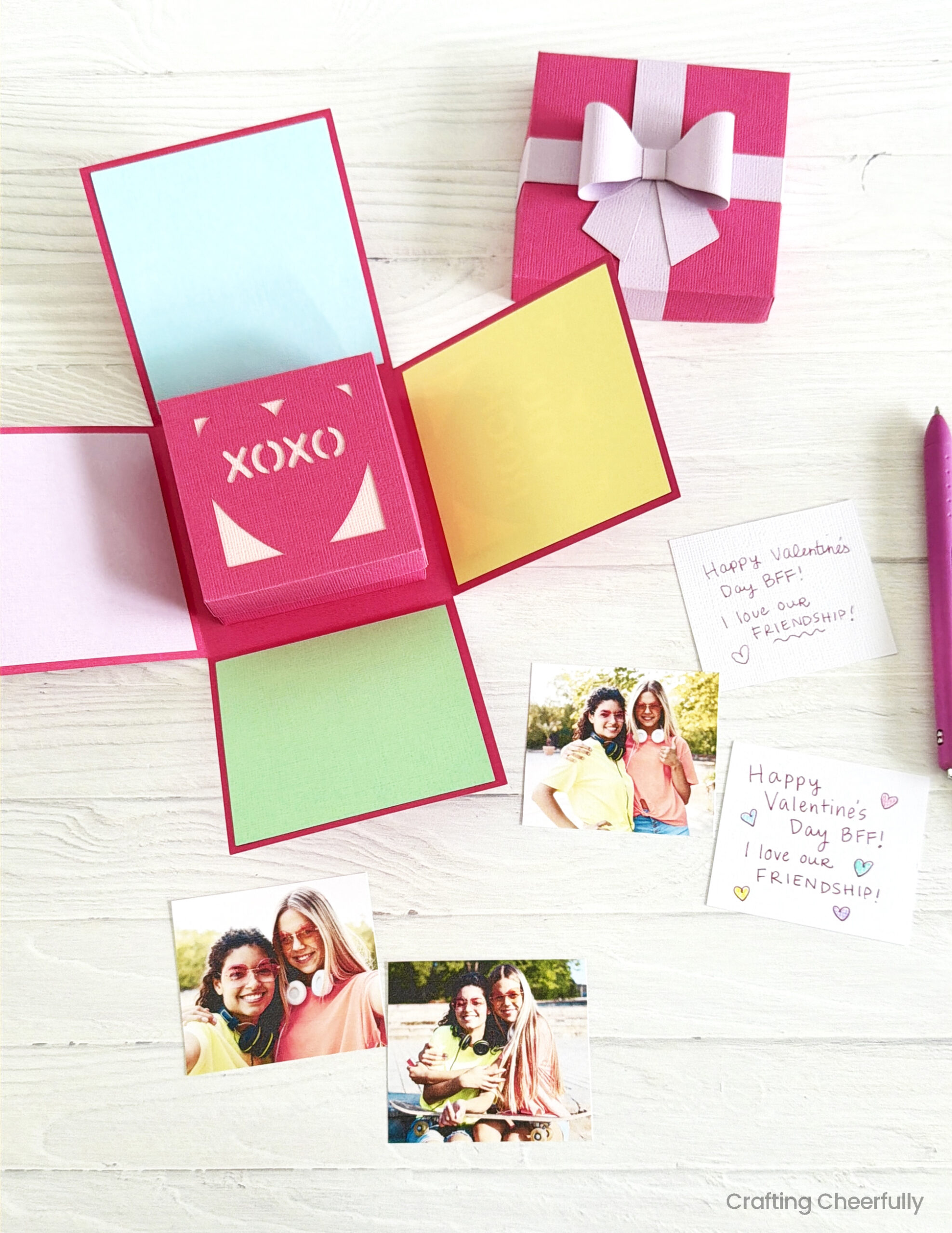 Cut out pictures and small notes are ready to be added to the explosion box.