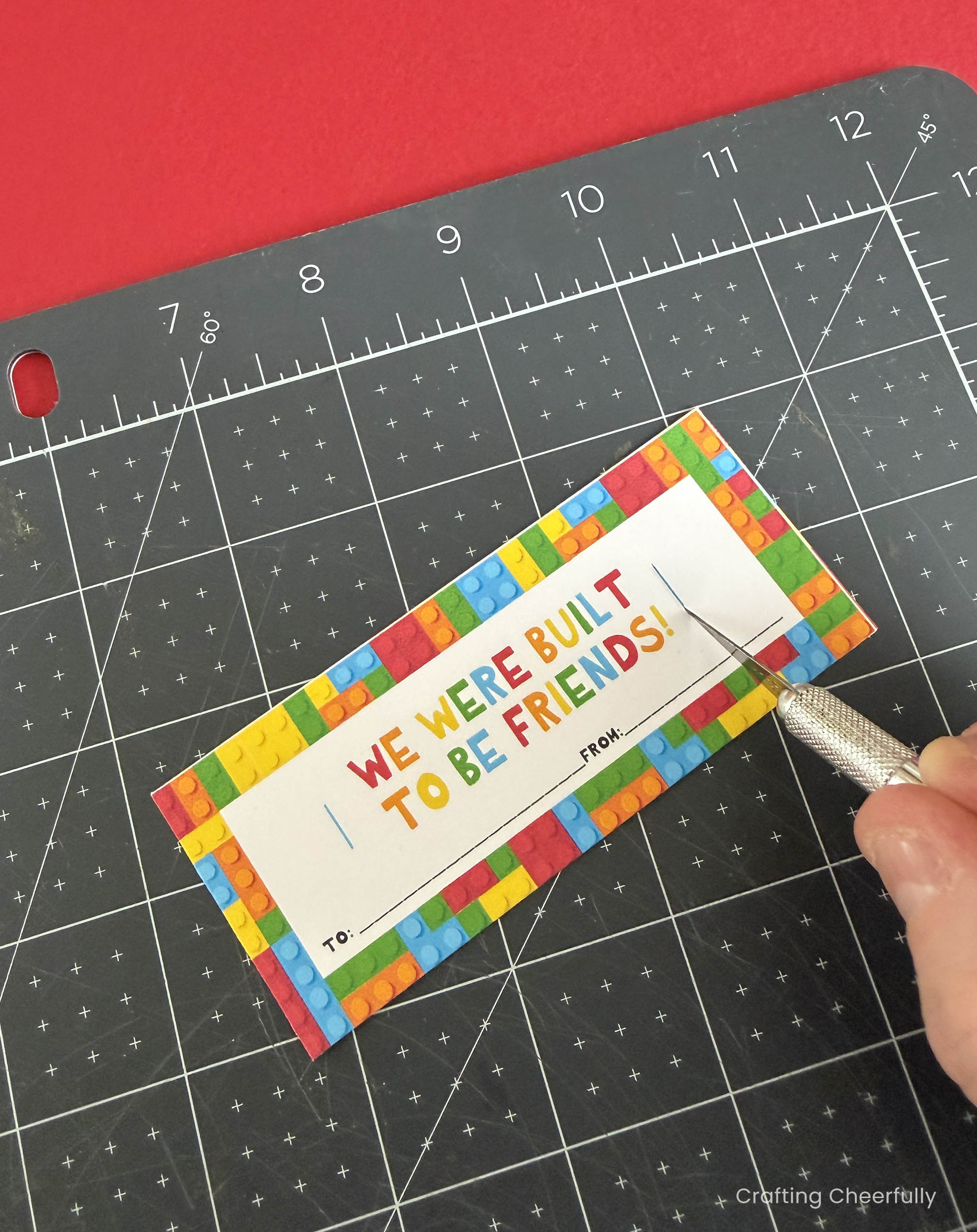 A craft knife was used to cut slits in the valentine for the pencil to slide through.