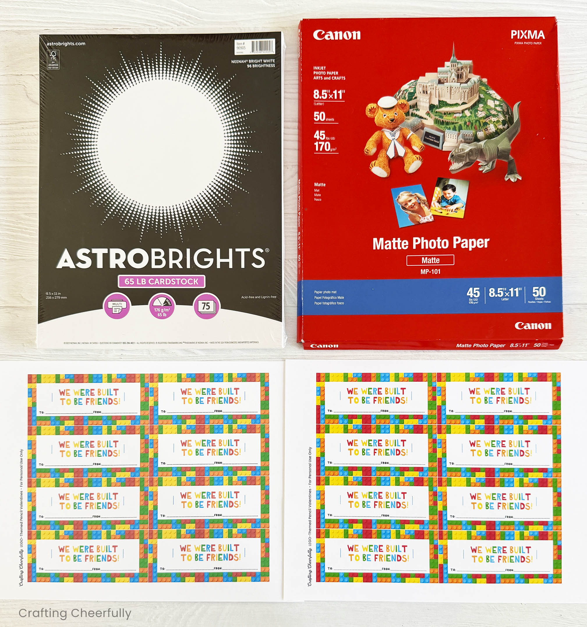 Two packs of paper with a printed sheet of valentine's underneath each one.