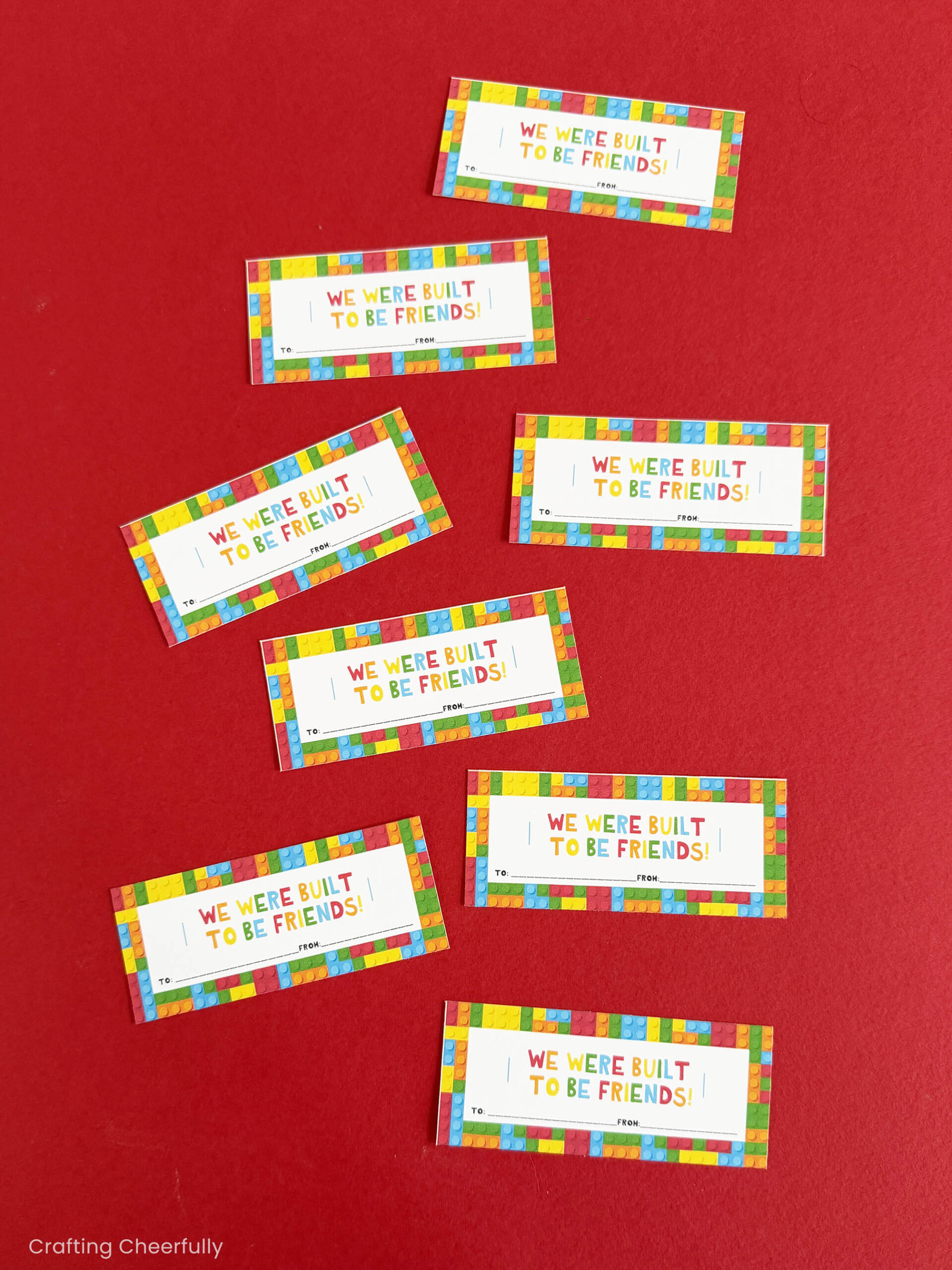 The valentine's are cut out and shown on a red background.