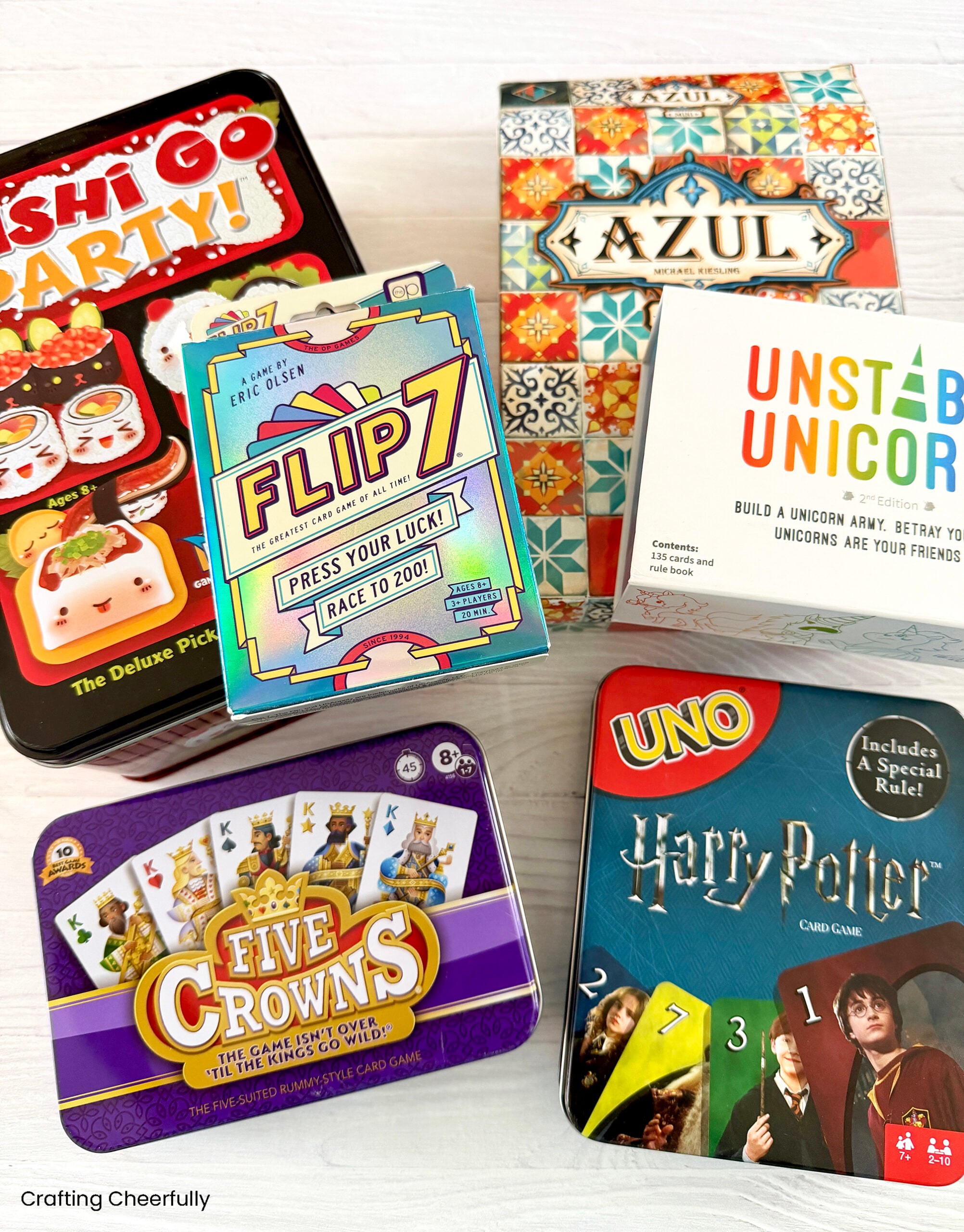 A group of games on a white table.