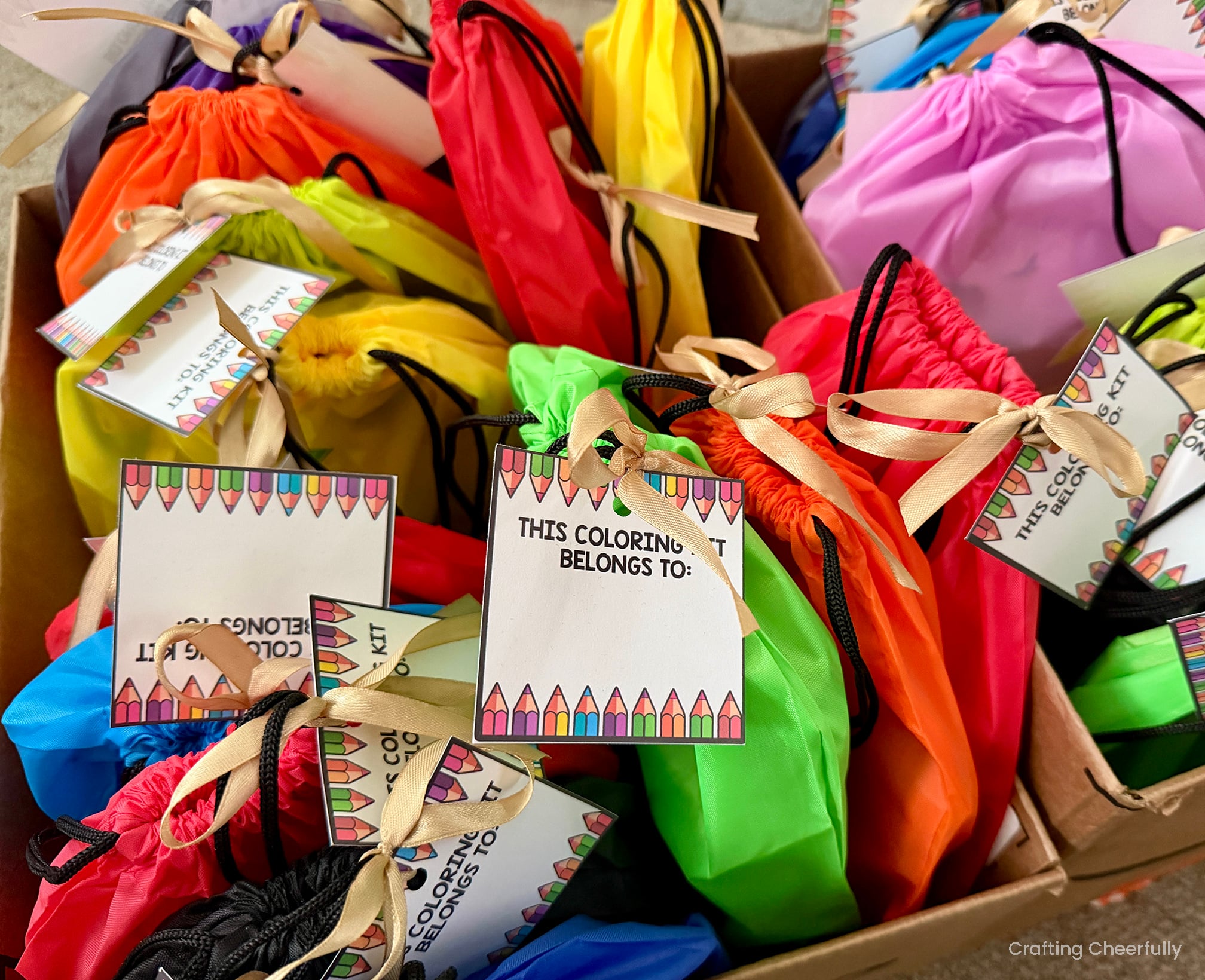 Paper tags added to each cinch sack bag.