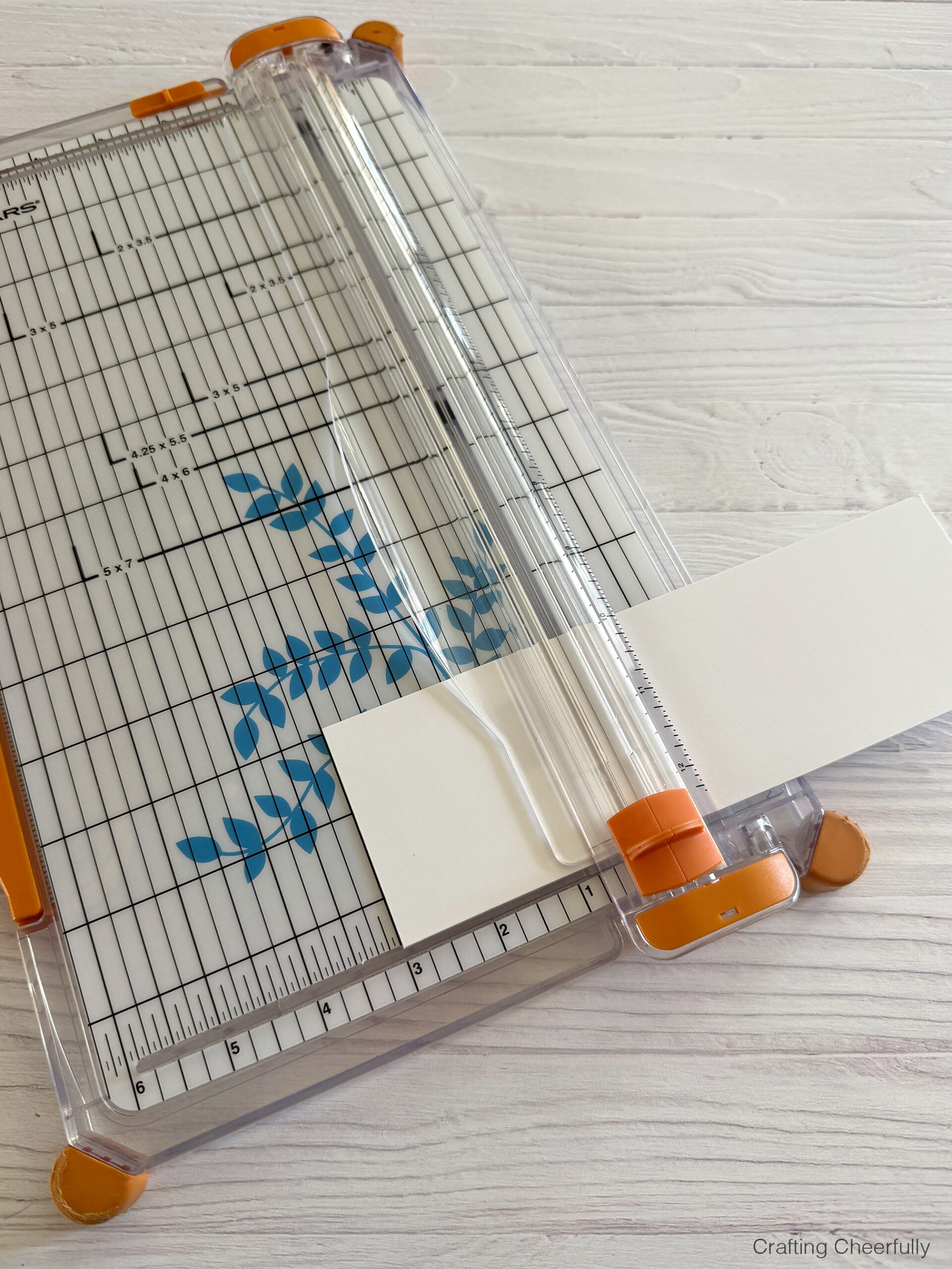 A small piece of chipboard is cut to fit in the bottom of the basket.