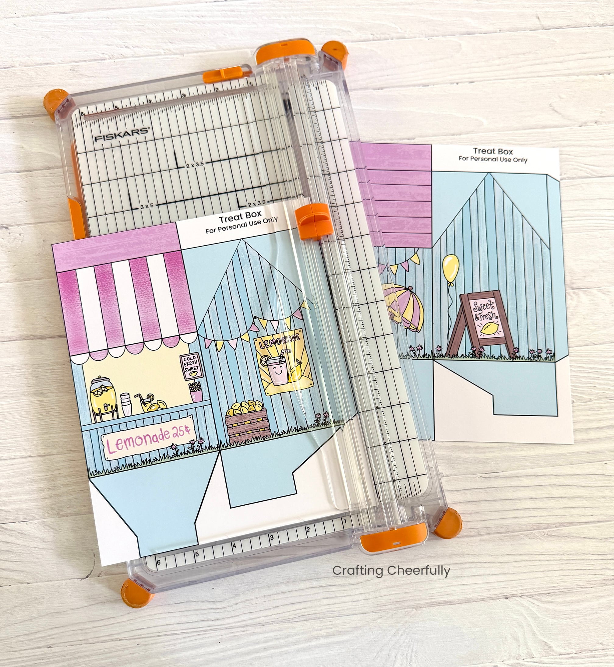 Treat box printables are cut out using a paper trimmer.