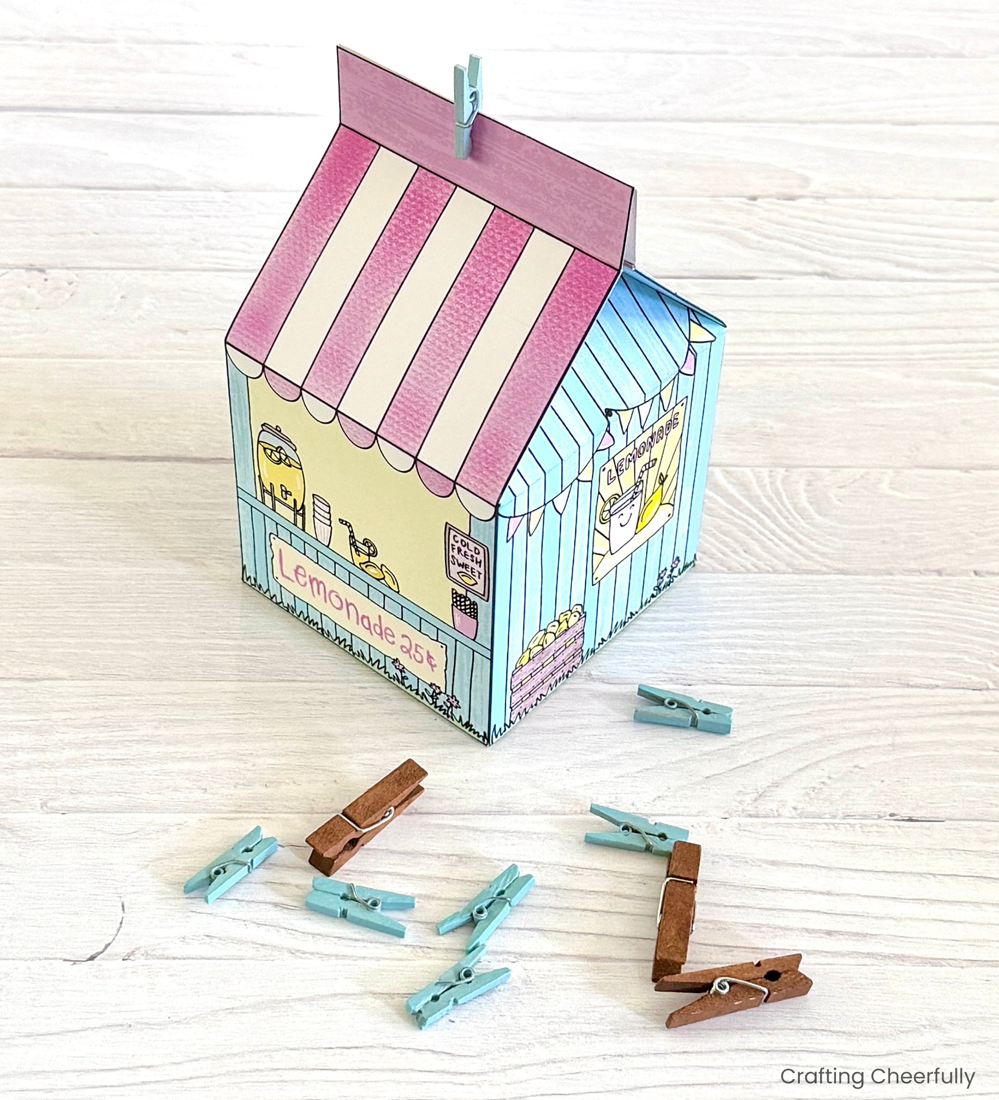 Tiny clothespins are used to close the treat box.