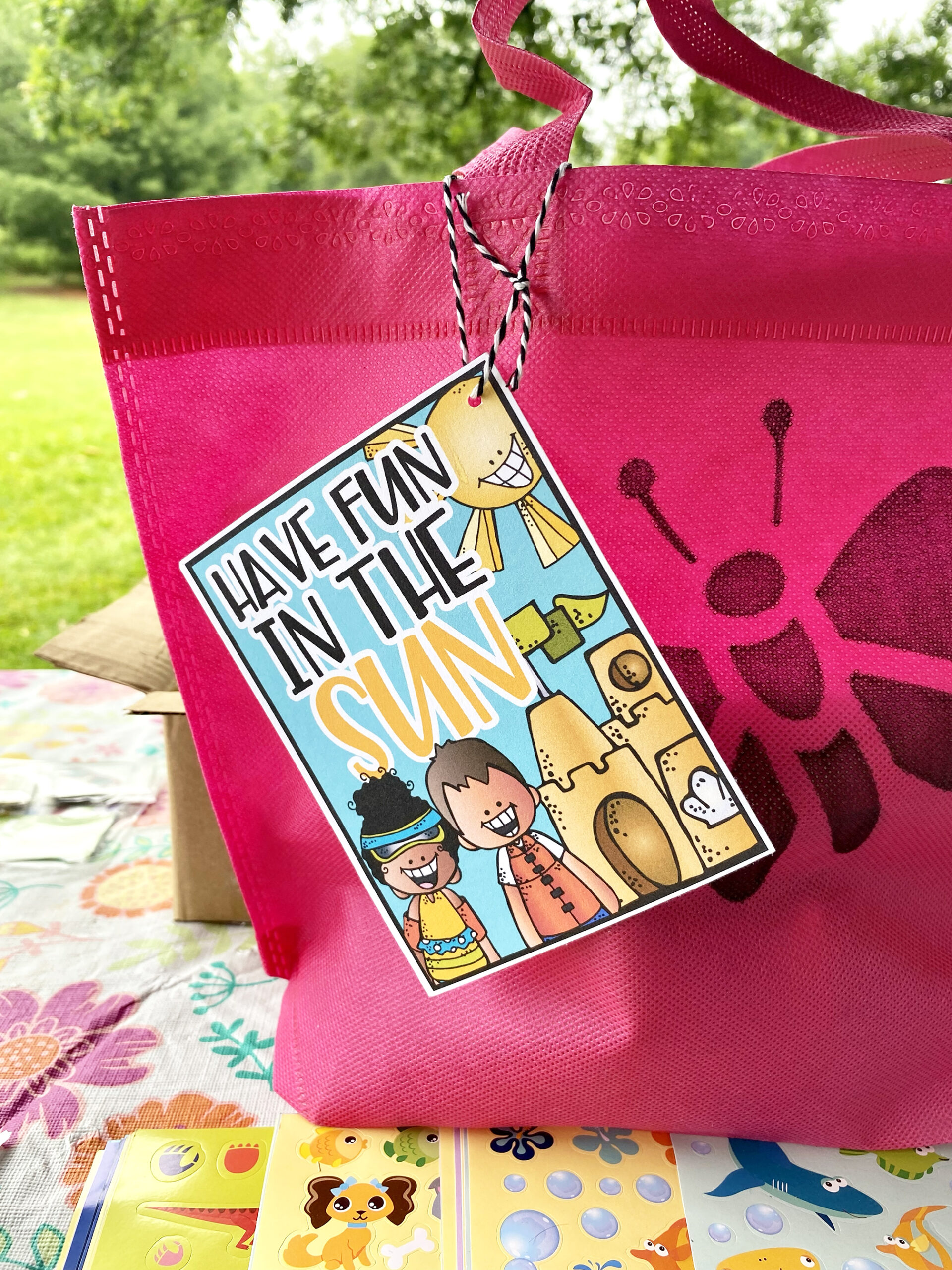 An activity kit with a cute and colorful take that reads "have fun in the sun".
