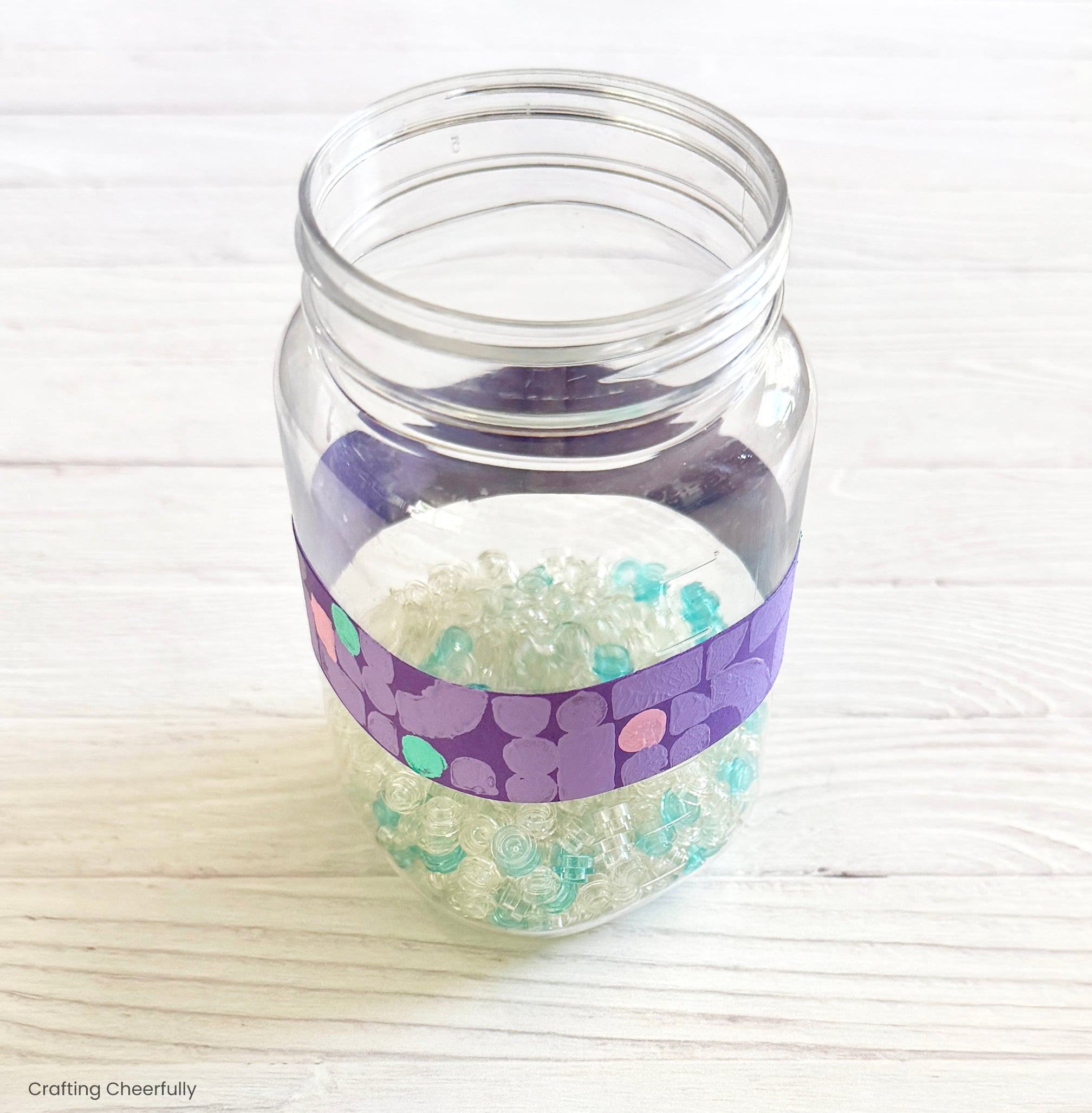 Mason jar is filled with LEGO vase filler pieces.