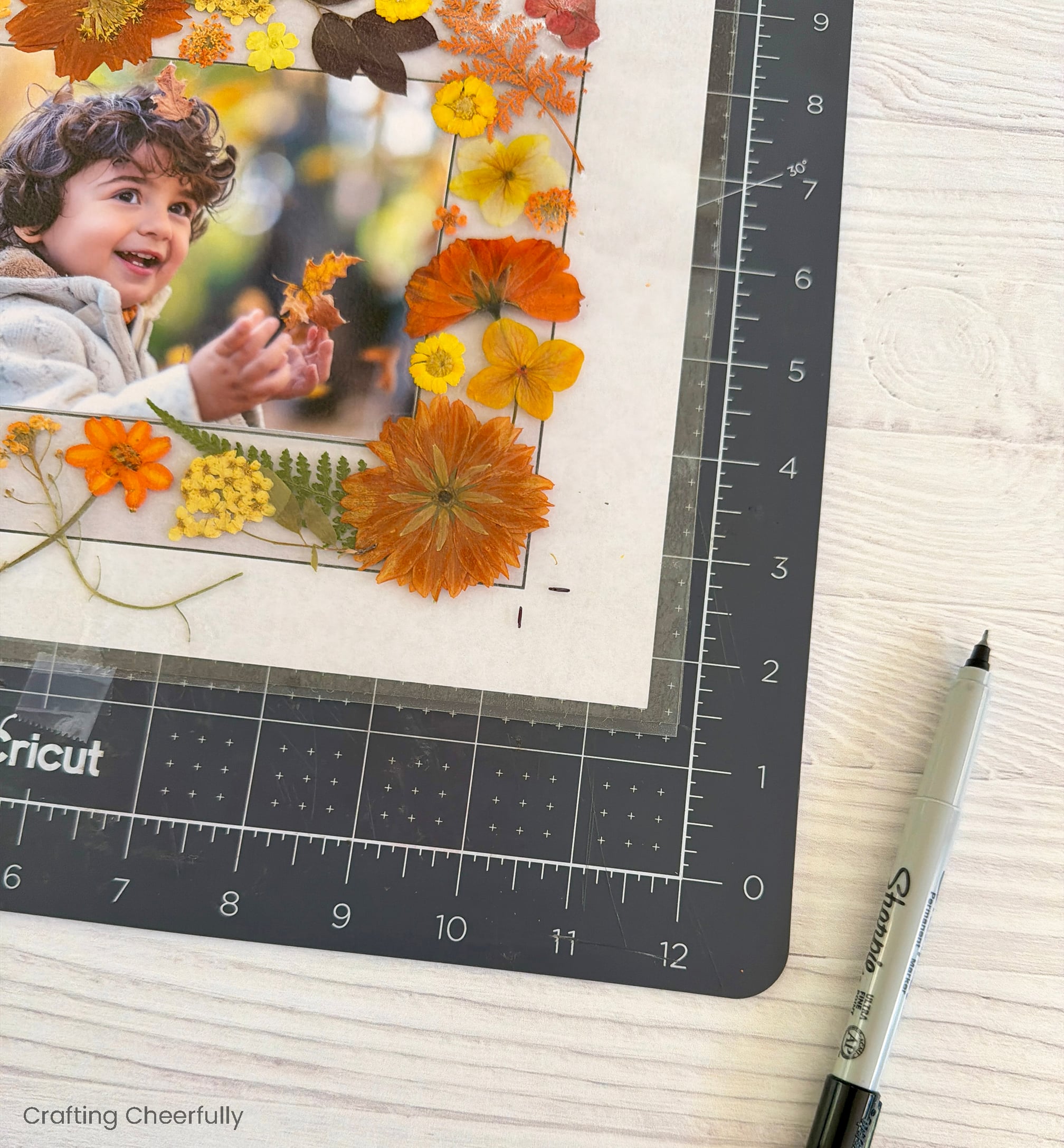 Sharpie is used to mark the corners of the floral frames.