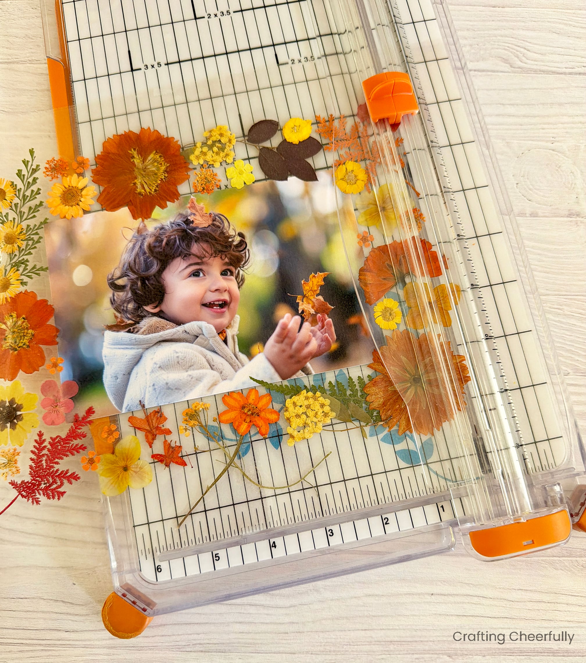 Paper trimmer used to cut out the floral frame.