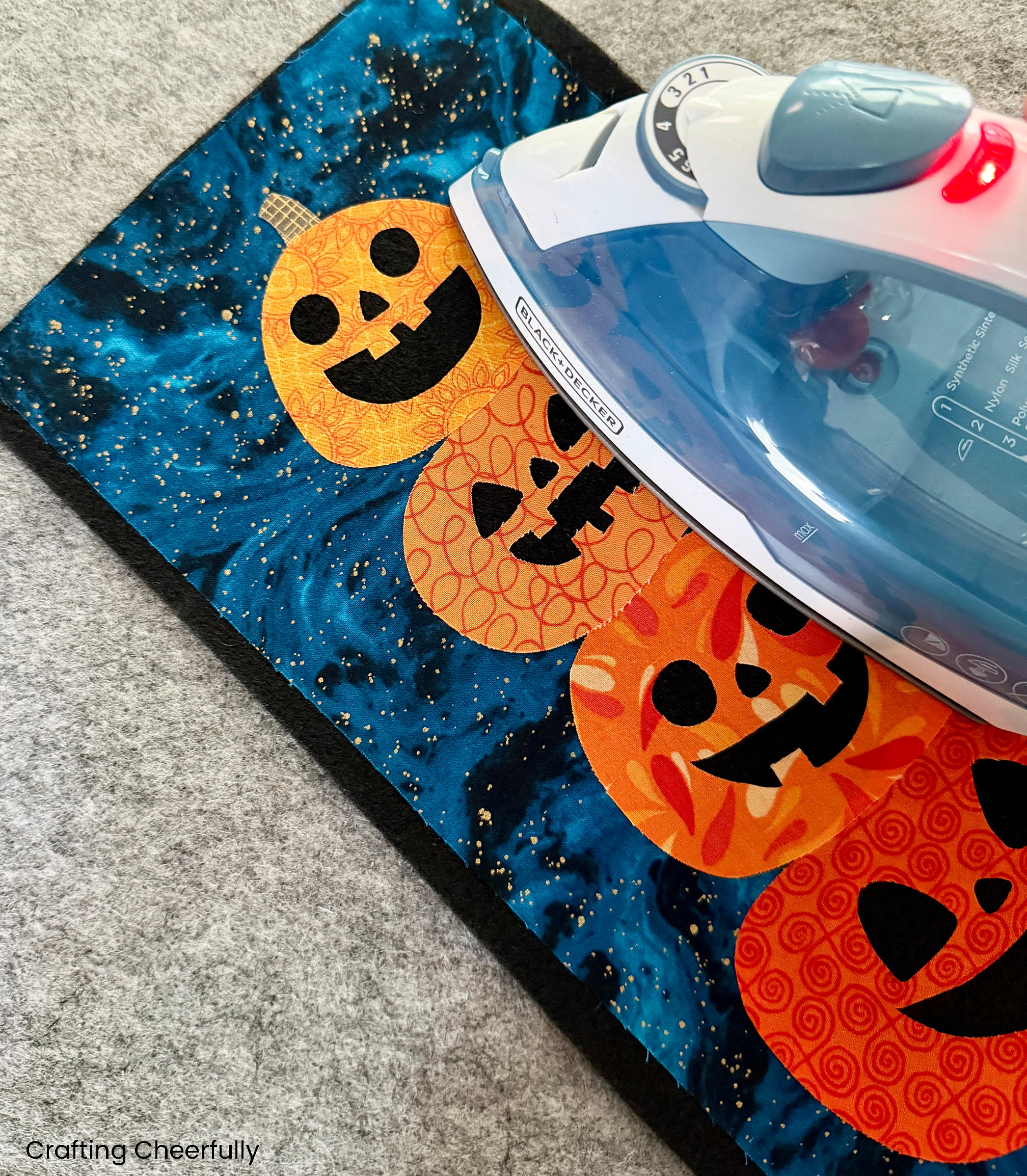 All five pumpkins are ironed on to the pennant.