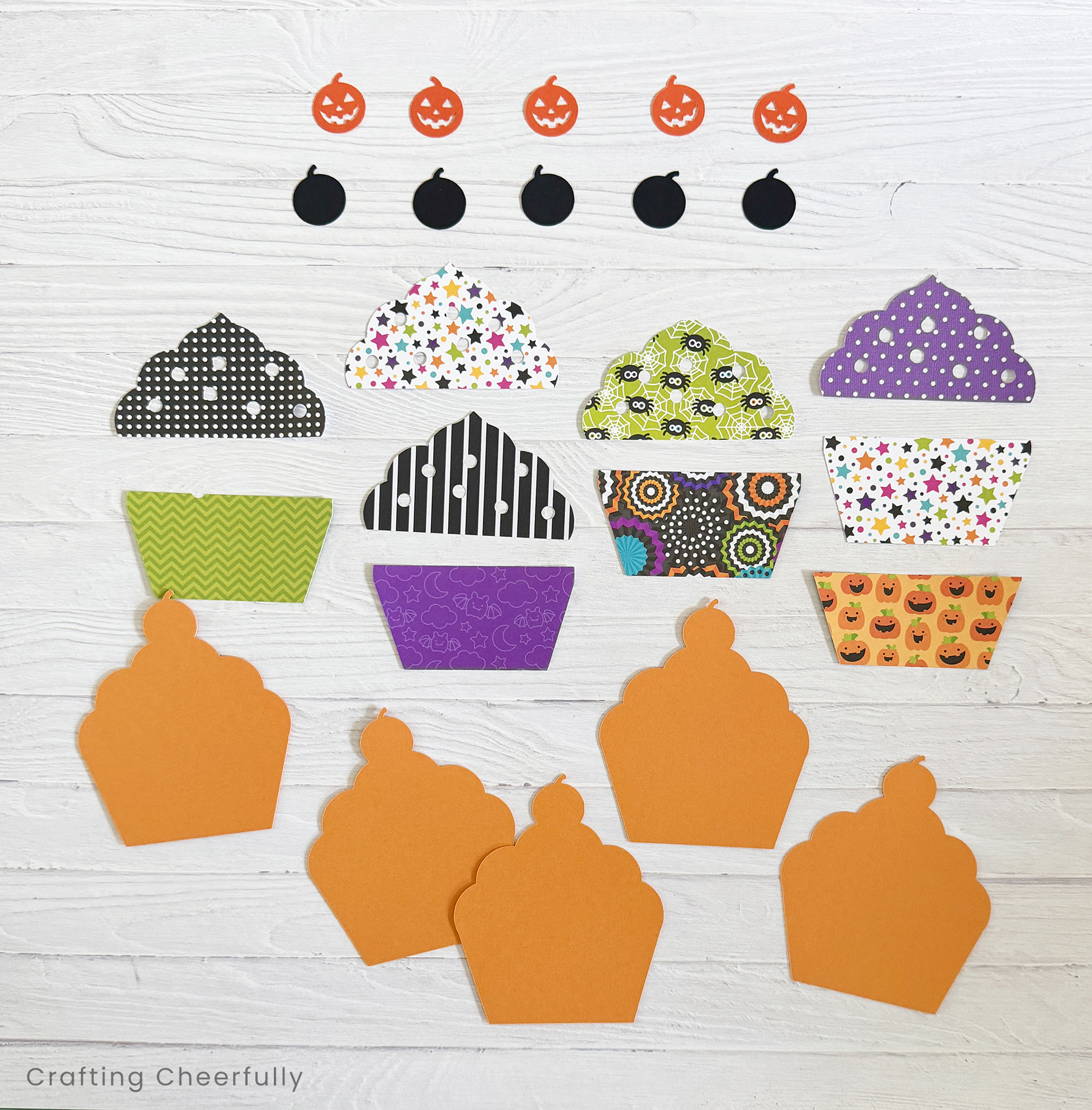 All of the paper pieces for the cupcake banner are cut out and ready to be assembled.