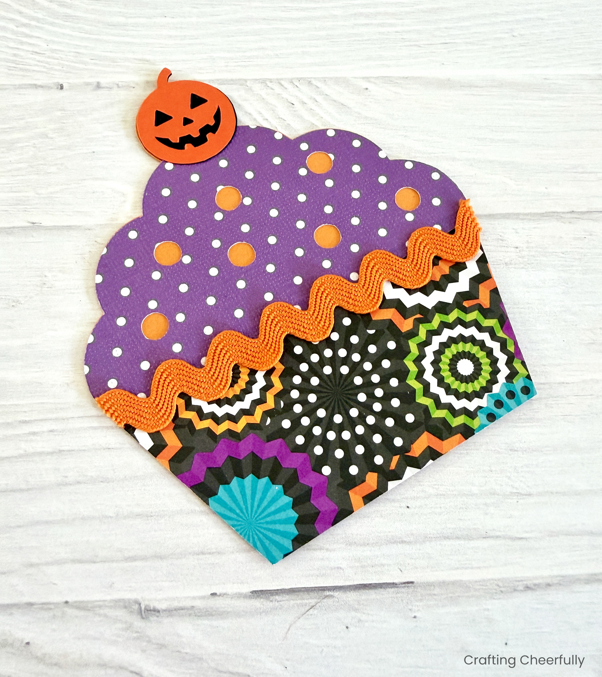 A jack o'lantern is the cherry on top of the cupcake.