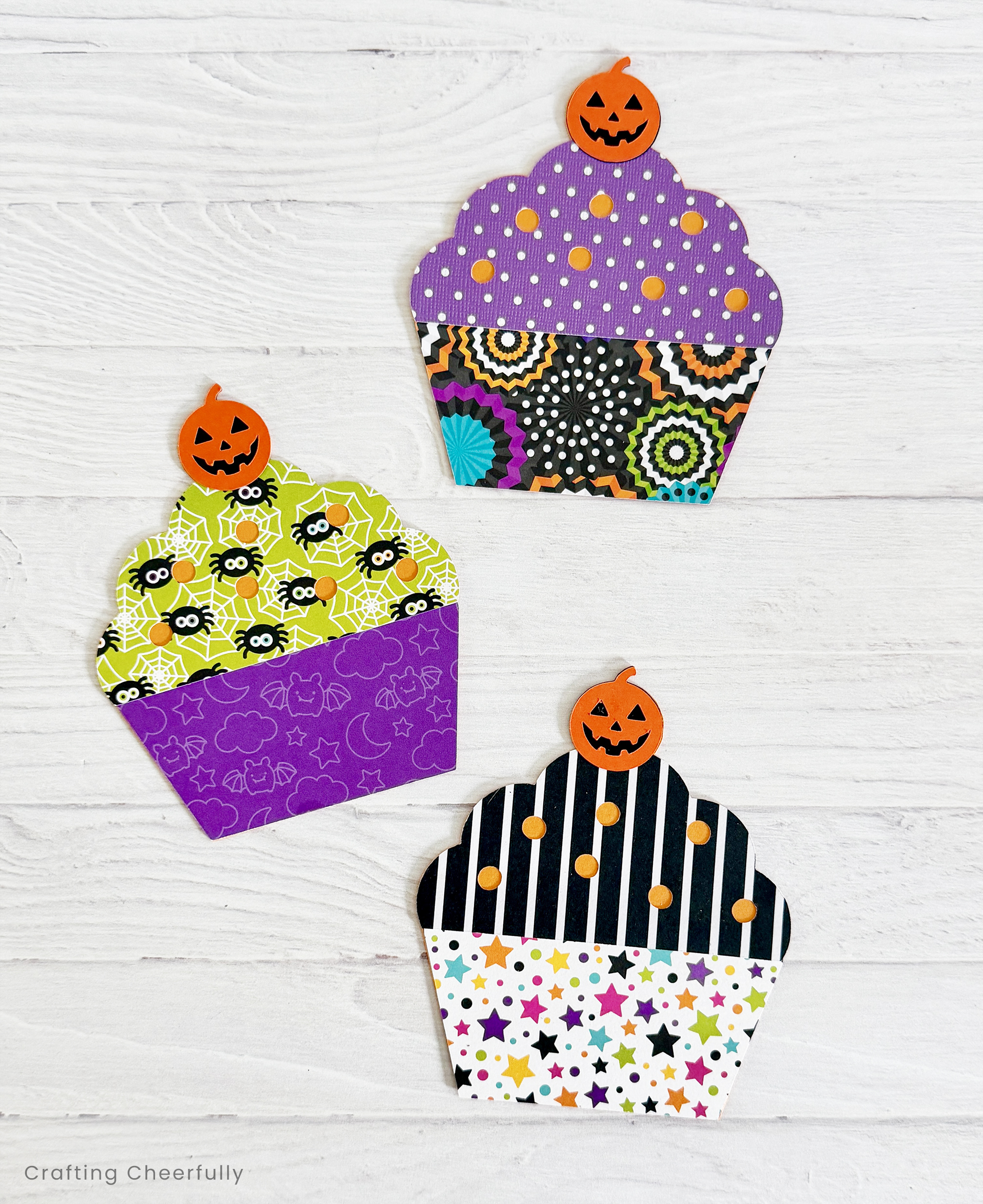 Cupcake pennants with the jack-o'-lantern cherries on top.